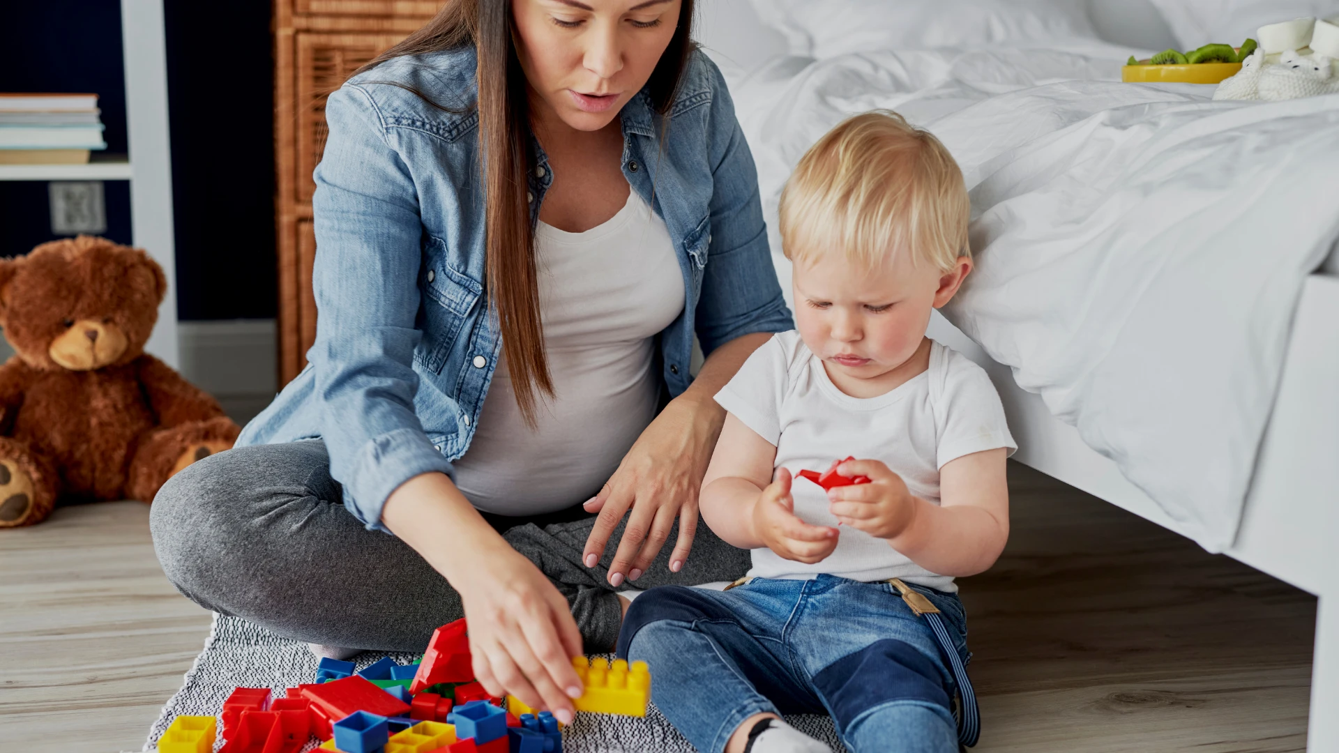 Mother plays with their son