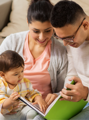 family reading Mother plays with their son